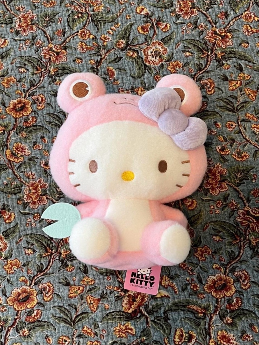 Sanrio Hello Kitty Pink Plush Toy Frog
Suit with Purple Bow